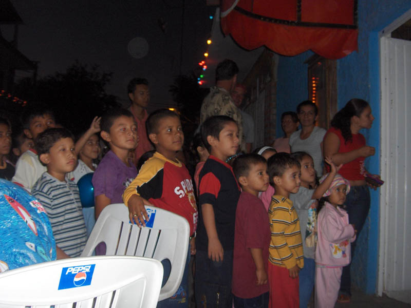Mexican Ninos lining up for Presents