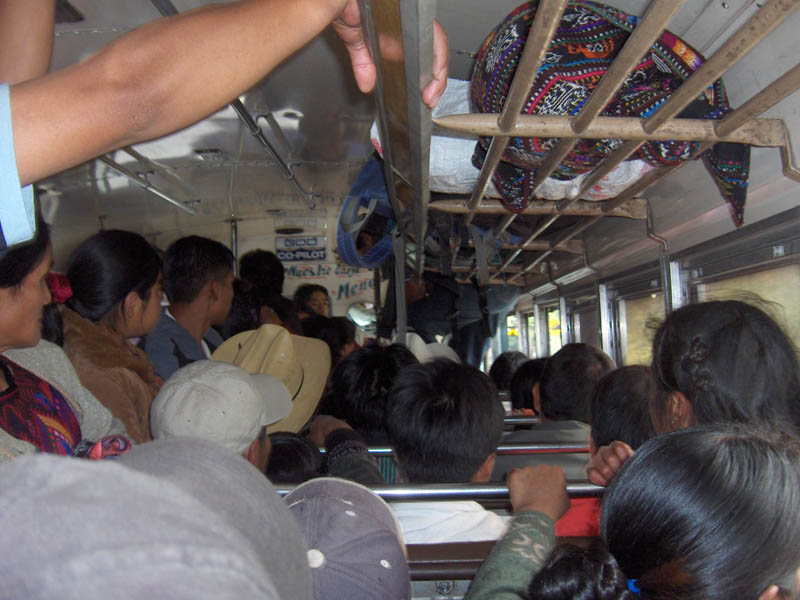 Always Room for a few more people on a chicken Bus